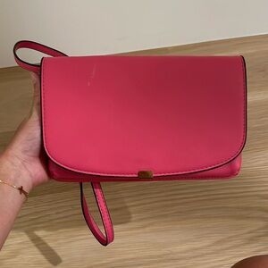 A new day pink purse really cute has lots of pockets and mirror!